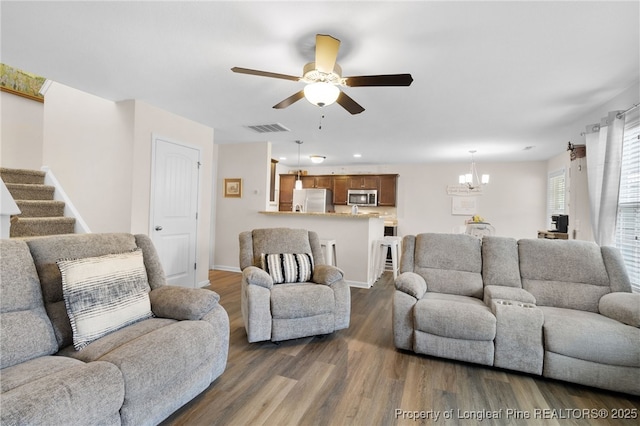 1206 Coot Ct, Hope Mills, NC 28348 - living room featuring ceiling fan, dark wood-style floors, a chandelier, and recessed lighting