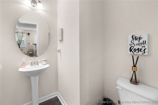1206 Coot Ct, Hope Mills, NC 28348 - bathroom with toilet and a sink