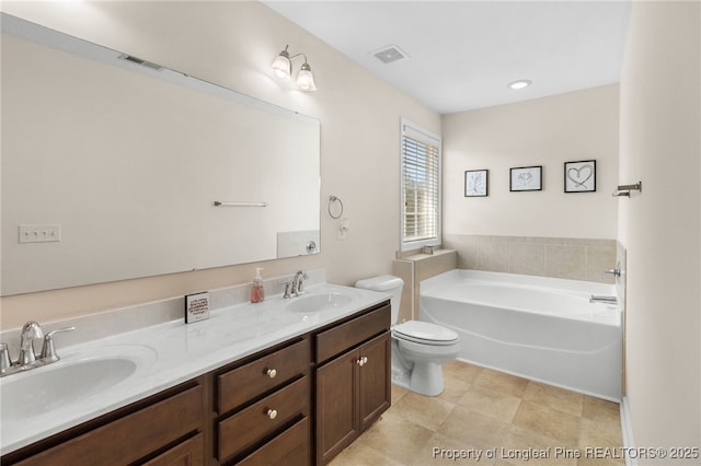 1206 Coot Ct, Hope Mills, NC 28348 - bathroom featuring a garden tub, double vanity, and tile patterned flooring