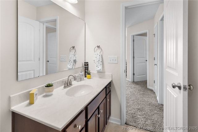 1206 Coot Ct, Hope Mills, NC 28348 - bathroom with vanity and baseboards