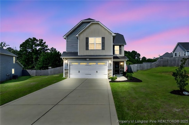 1206 Coot Ct, Hope Mills, NC 28348 - traditional-style house featuring board and batten siding, an attached garage, stone siding, and driveway