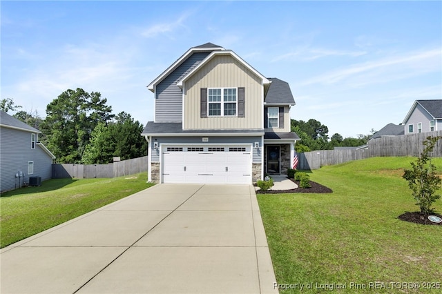1206 Coot Ct, Hope Mills, NC 28348 - view of front of property featuring stone siding, a garage, concrete driveway, and board and batten siding