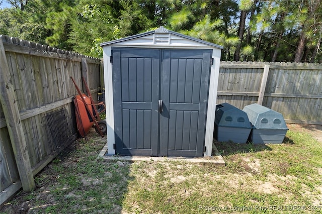 1206 Coot Ct, Hope Mills, NC 28348 - view of shed featuring a fenced backyard