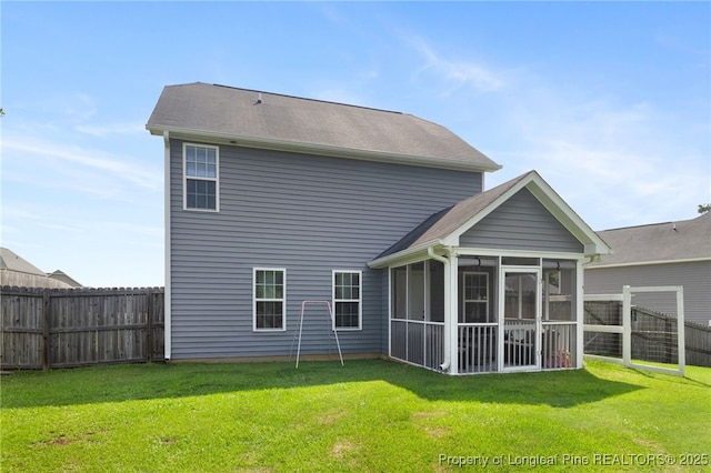 1206 Coot Ct, Hope Mills, NC 28348 - back of property featuring a fenced backyard and a sunroom
