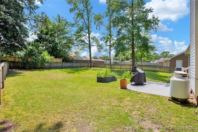 4327 Falls Dr, Hope Mills, NC 28348 - fenced backyard with a patio area