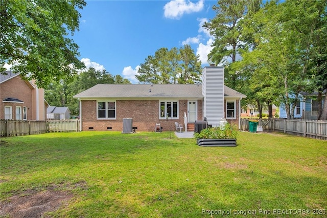 4327 Falls Dr, Hope Mills, NC 28348 - rear view of property with brick siding, a fenced backyard, a chimney, and crawl space