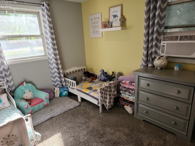 bedroom featuring dark carpet