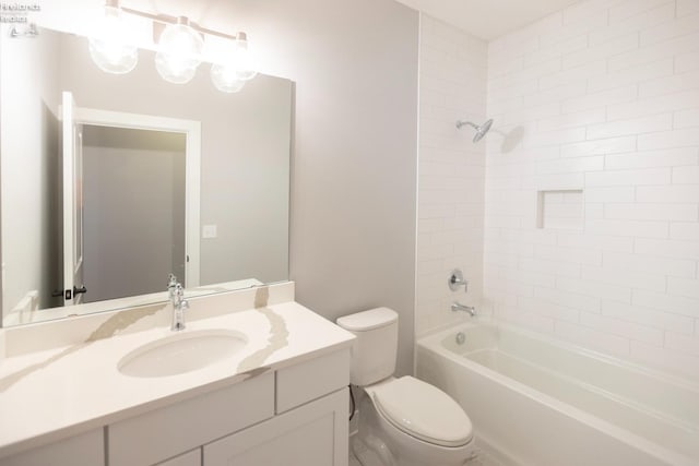 full bathroom with shower / bath combination, vanity, and toilet