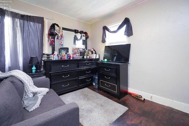 living area with dark hardwood / wood-style flooring