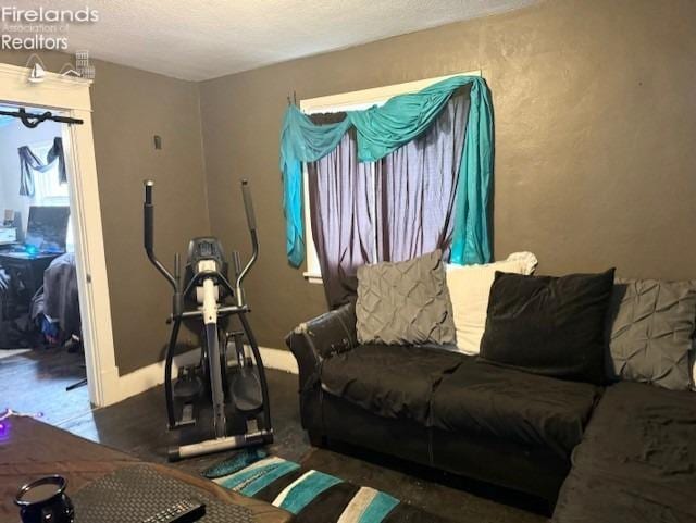 living room featuring a textured ceiling