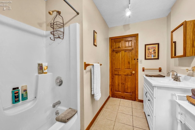 bathroom with tile flooring, shower / bath combination, a textured ceiling, and oversized vanity