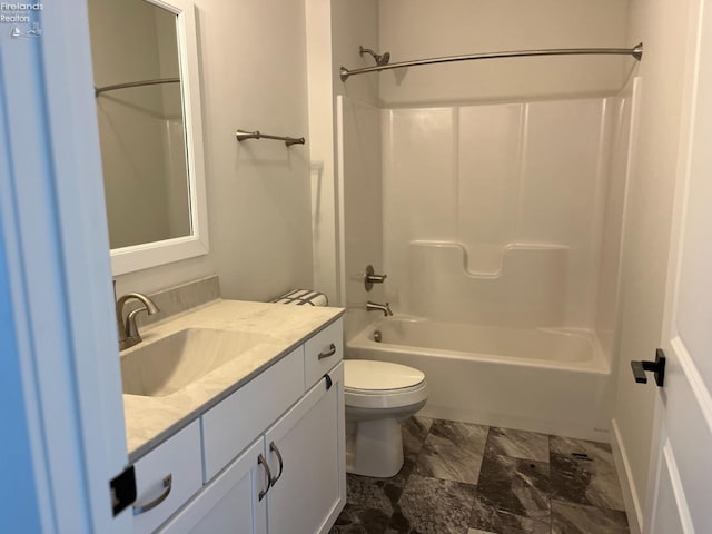 full bath featuring shower / washtub combination, vanity, and toilet