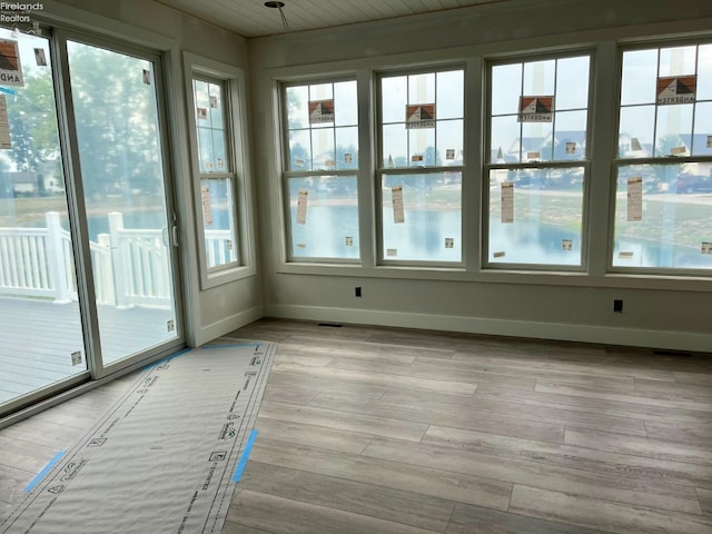 view of unfurnished sunroom