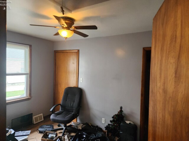 misc room featuring hardwood / wood-style flooring and ceiling fan