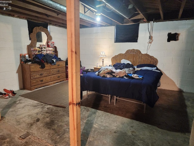 bedroom with concrete flooring