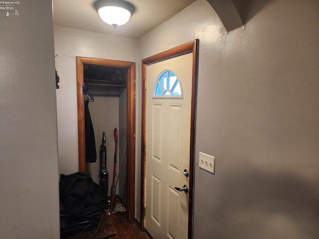 doorway with hardwood / wood-style floors