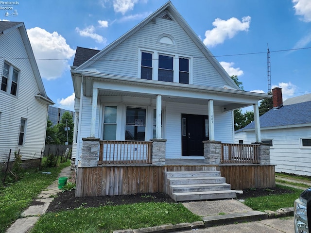 bungalow-style home with a porch