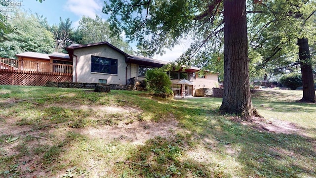 view of yard featuring a deck