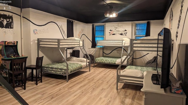 bedroom featuring wood-type flooring