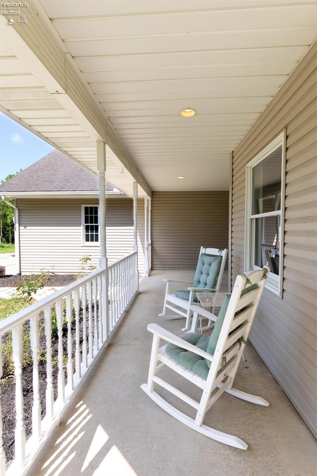 view of patio featuring a porch