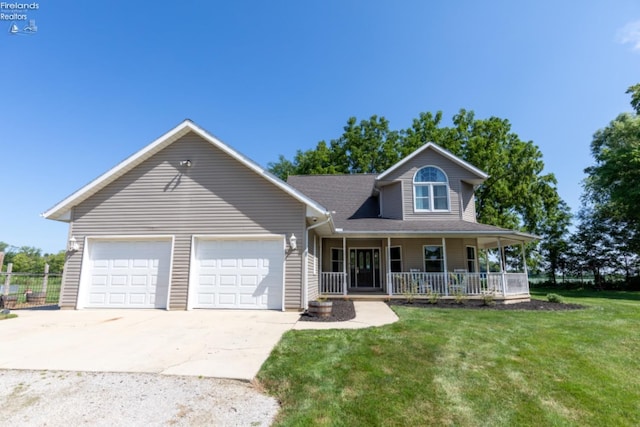 view of front facade featuring a garage, covered porch, and a front lawn