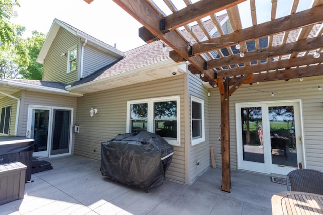 view of patio / terrace featuring a grill and a pergola