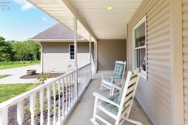 balcony featuring a porch