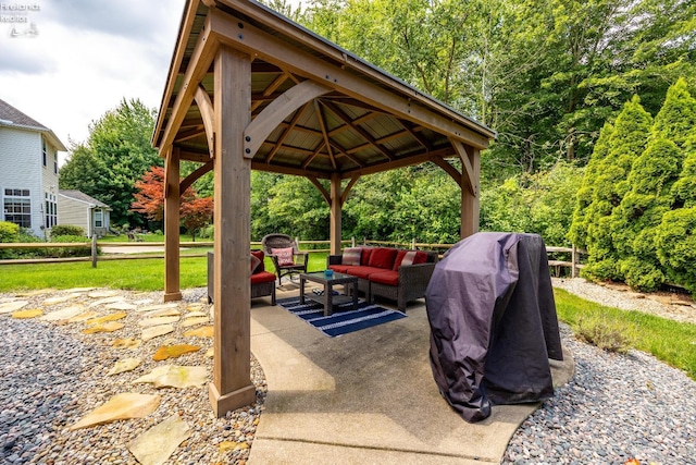 view of patio / terrace with outdoor lounge area and a gazebo