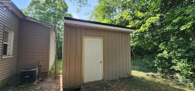 view of outbuilding featuring cooling unit