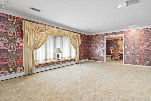 carpeted spare room with crown molding