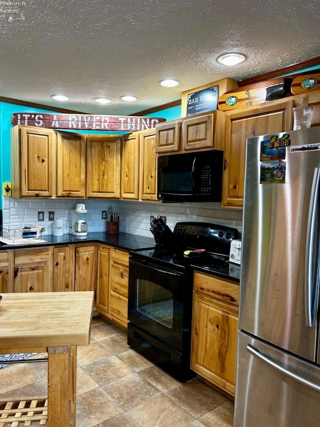 kitchen featuring a textured ceiling, black appliances, brown cabinetry, and backsplash