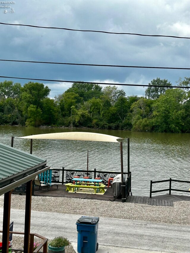 view of dock with a water view