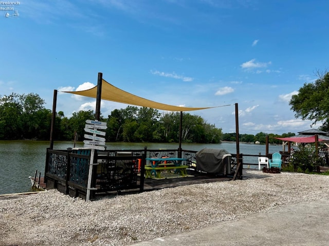 dock area featuring a water view