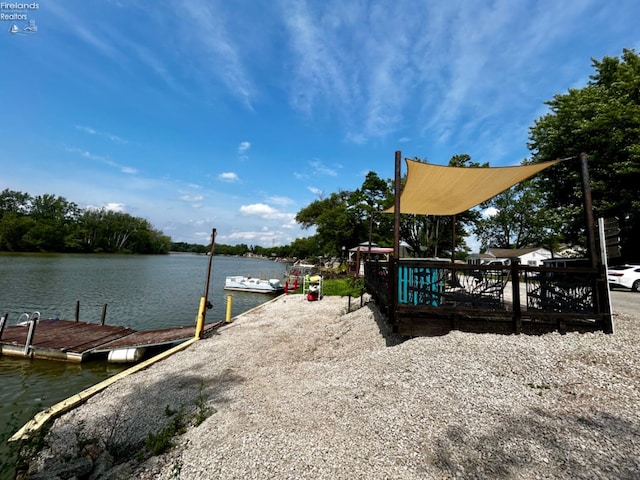 view of dock with a water view