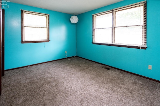 view of carpeted spare room