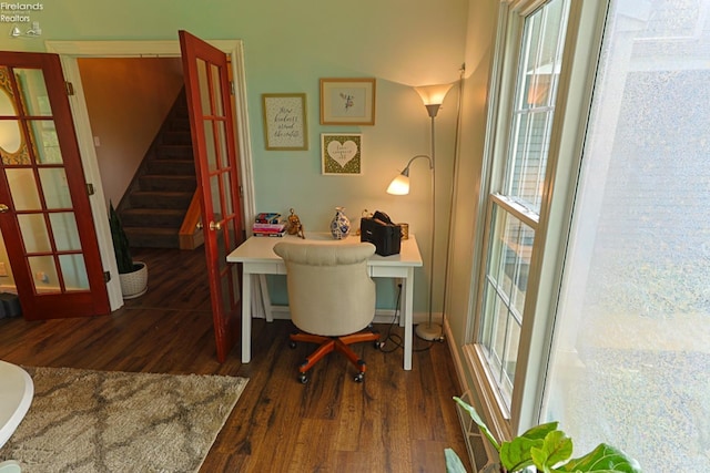 office space with dark hardwood / wood-style flooring