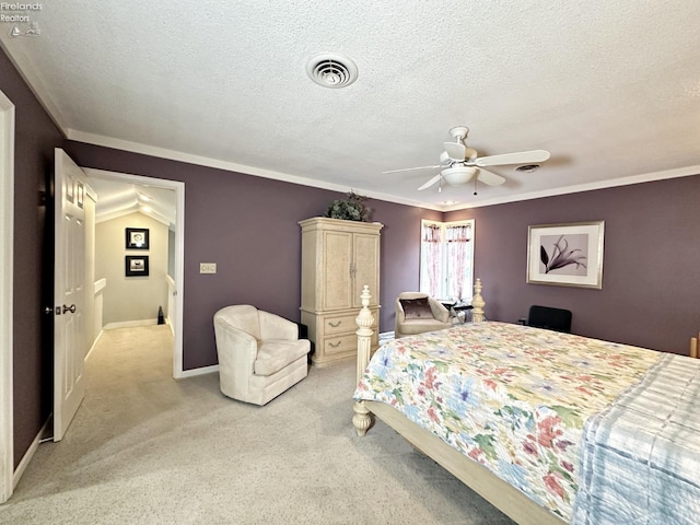 bedroom with ceiling fan, a textured ceiling, and light colored carpet