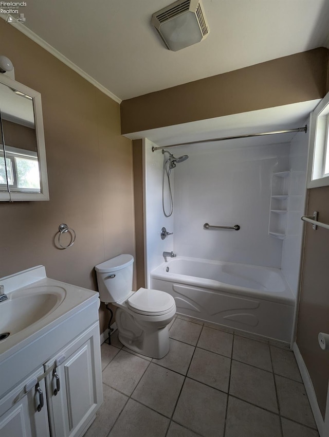 full bathroom with crown molding, toilet, shower / bath combination, tile patterned floors, and vanity