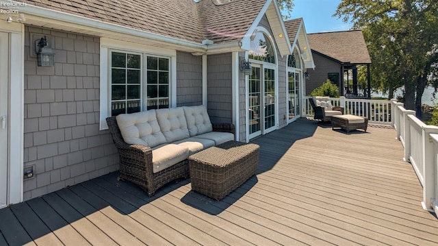 wooden deck featuring an outdoor living space