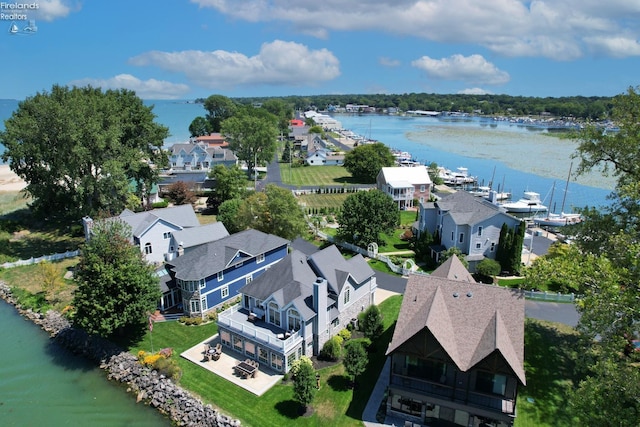 drone / aerial view with a water view