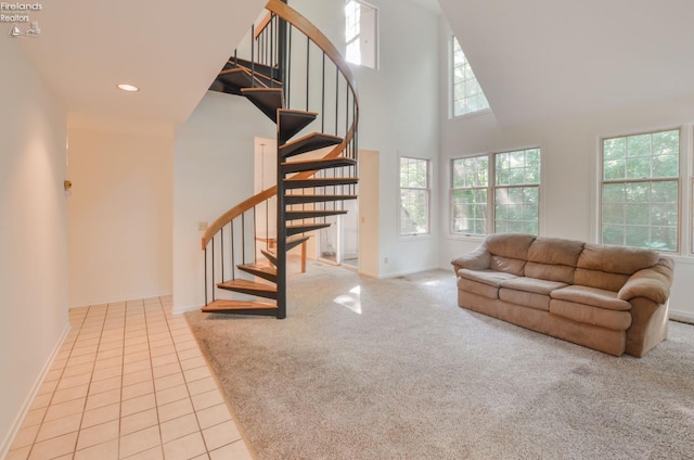 tiled living room featuring plenty of natural light