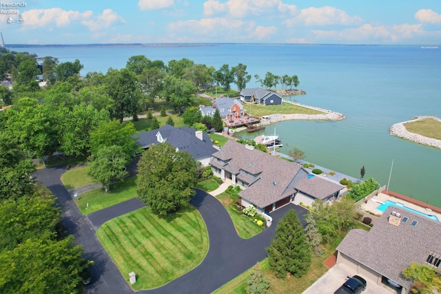 birds eye view of property featuring a water view