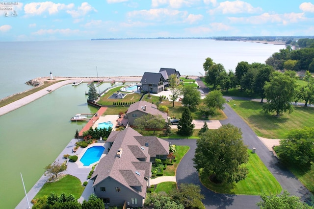 birds eye view of property featuring a water view