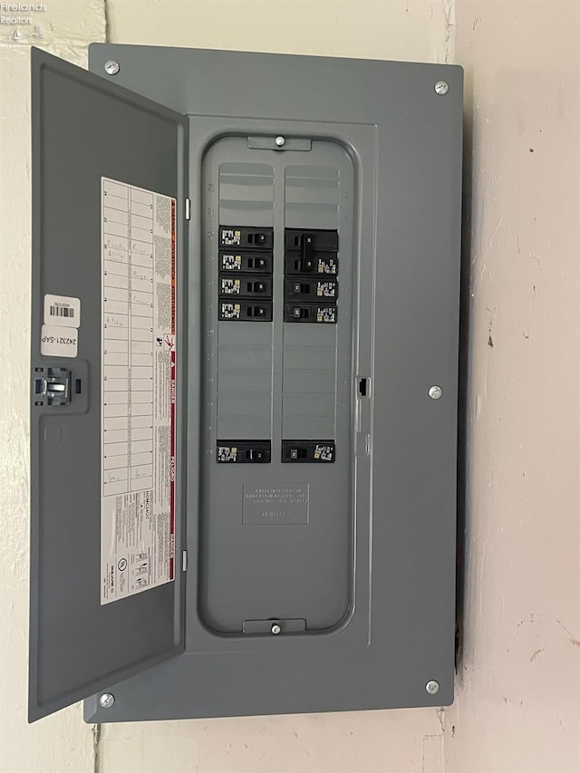 utility room featuring electric panel