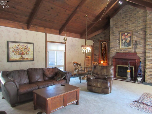 carpeted living room with beam ceiling, wood ceiling, high vaulted ceiling, a chandelier, and a brick fireplace