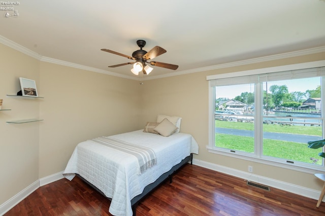 1909 N Nan Ave, Marblehead, OH 43440 - bedroom with baseboards, wood finished floors, ornamental molding, and multiple windows