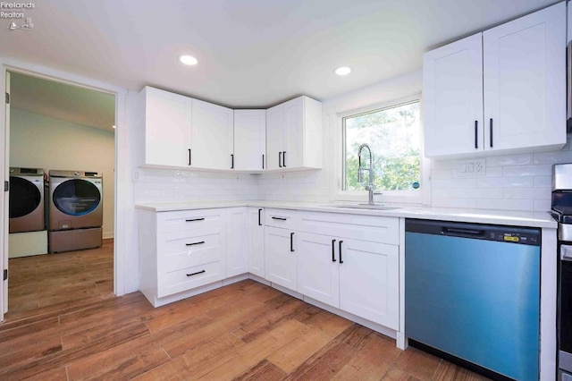 kitchen featuring dishwasher, light hardwood / wood-style flooring, and white cabinetry