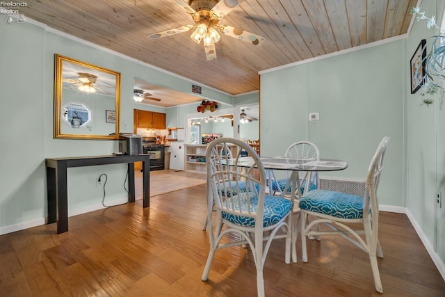 dining area with ceiling fan, ornamental molding, wooden ceiling, and hardwood / wood-style flooring