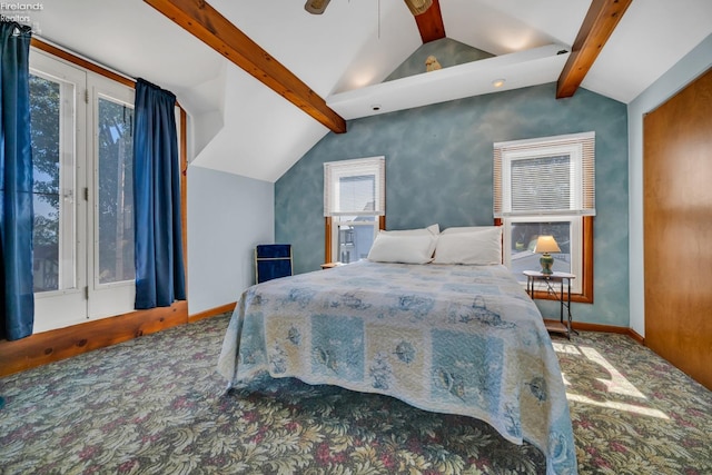 bedroom featuring ceiling fan and vaulted ceiling with beams