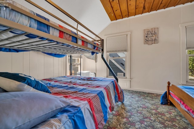 bedroom featuring wooden ceiling, lofted ceiling, and carpet